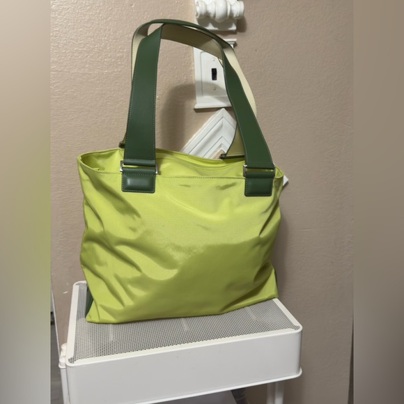 Tumi Handbags - Tumi Green Tote Bag excellent condition